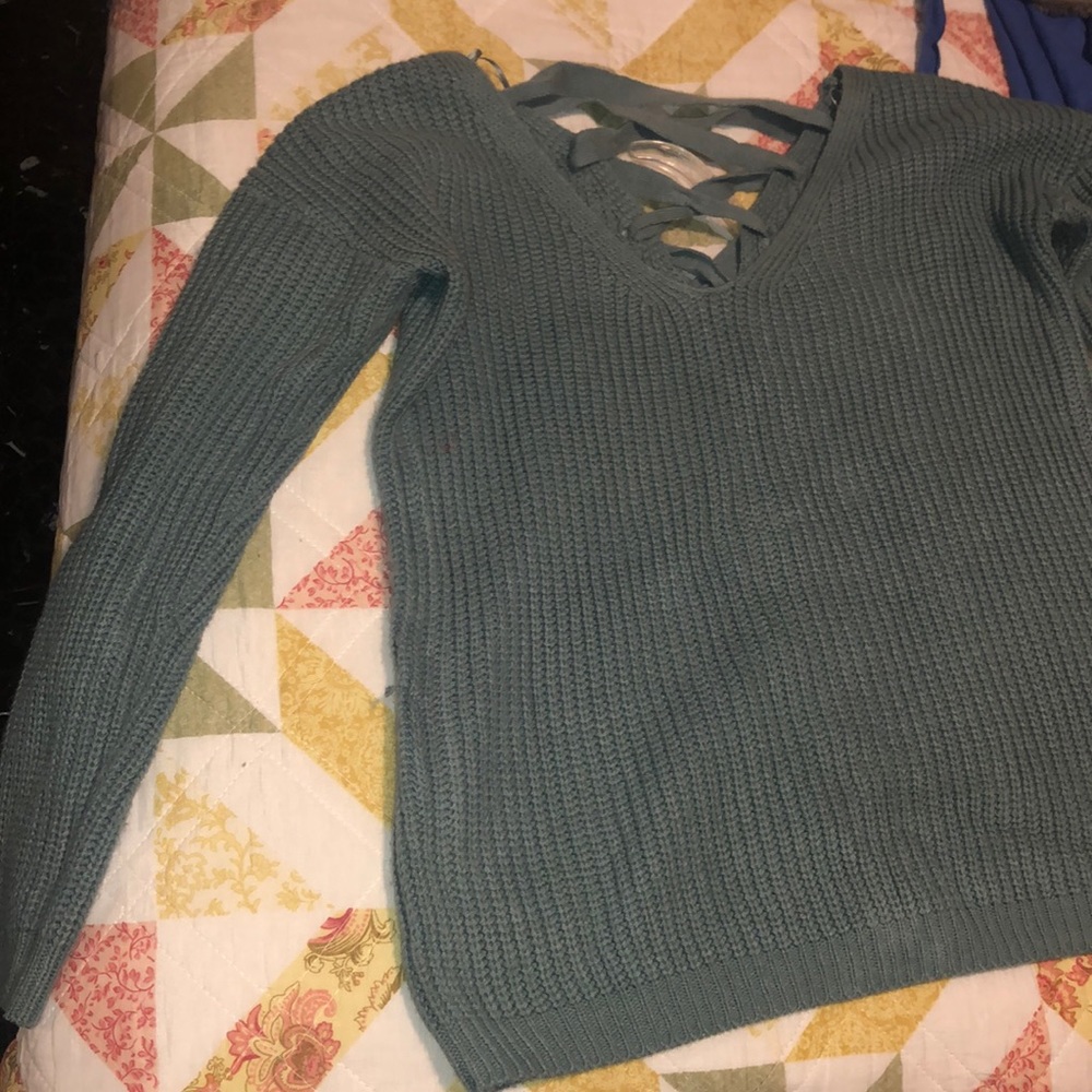 Beautiful blue sweater braided open back